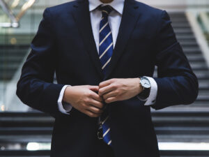 A man wearing a suit and tie.