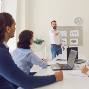 manager teaching employees