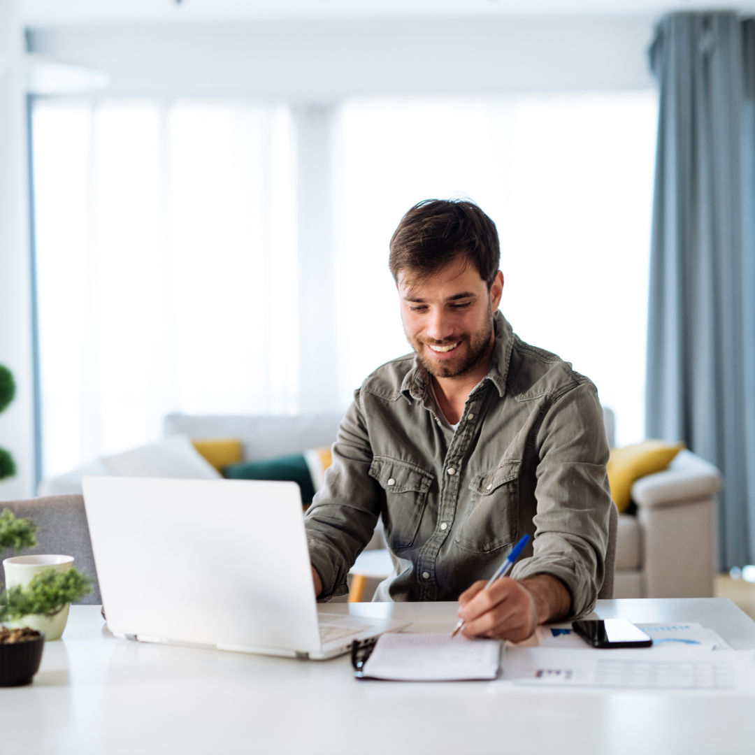 a guy taking an online class in his home