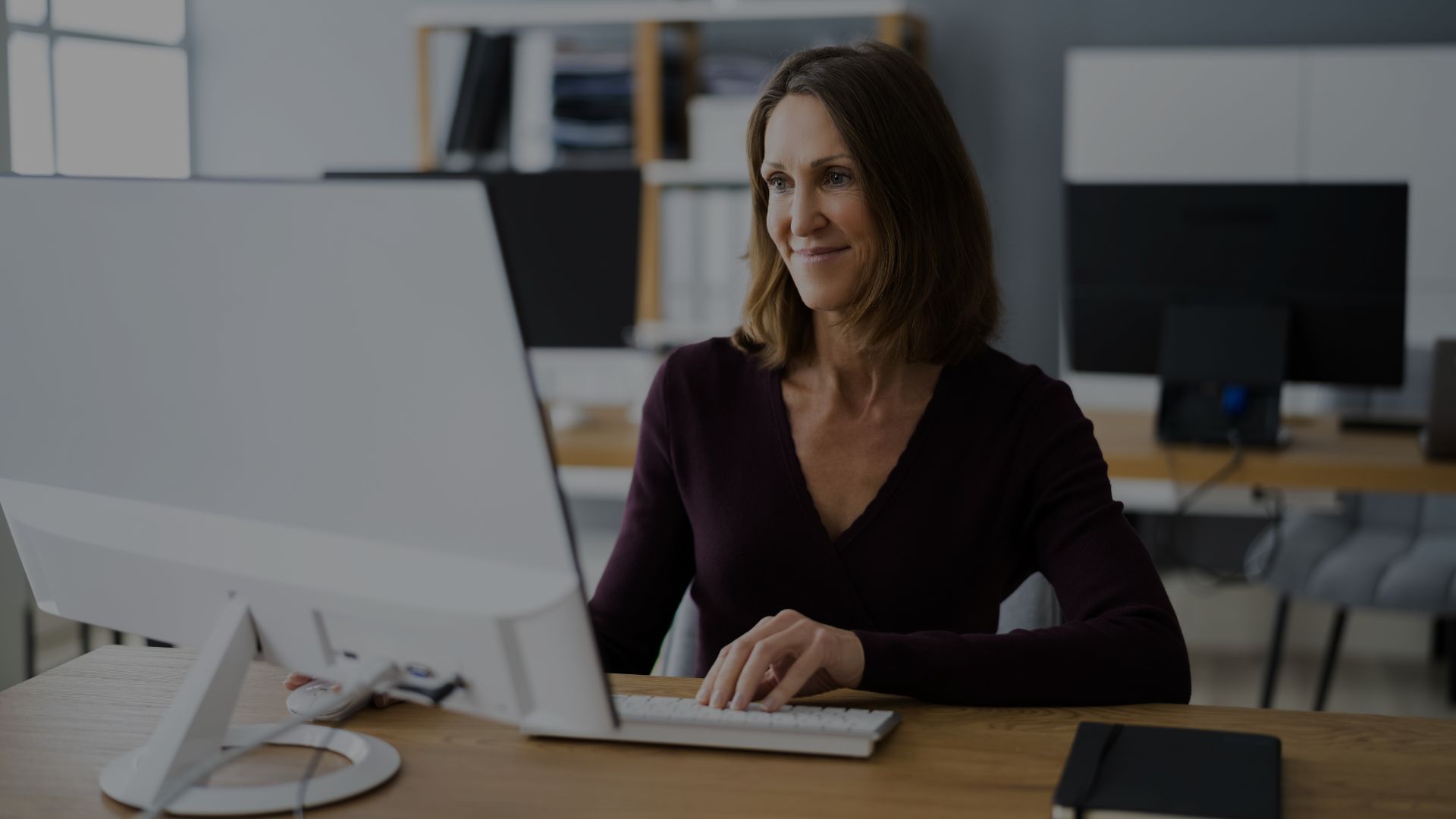 woman taking a professional development course online